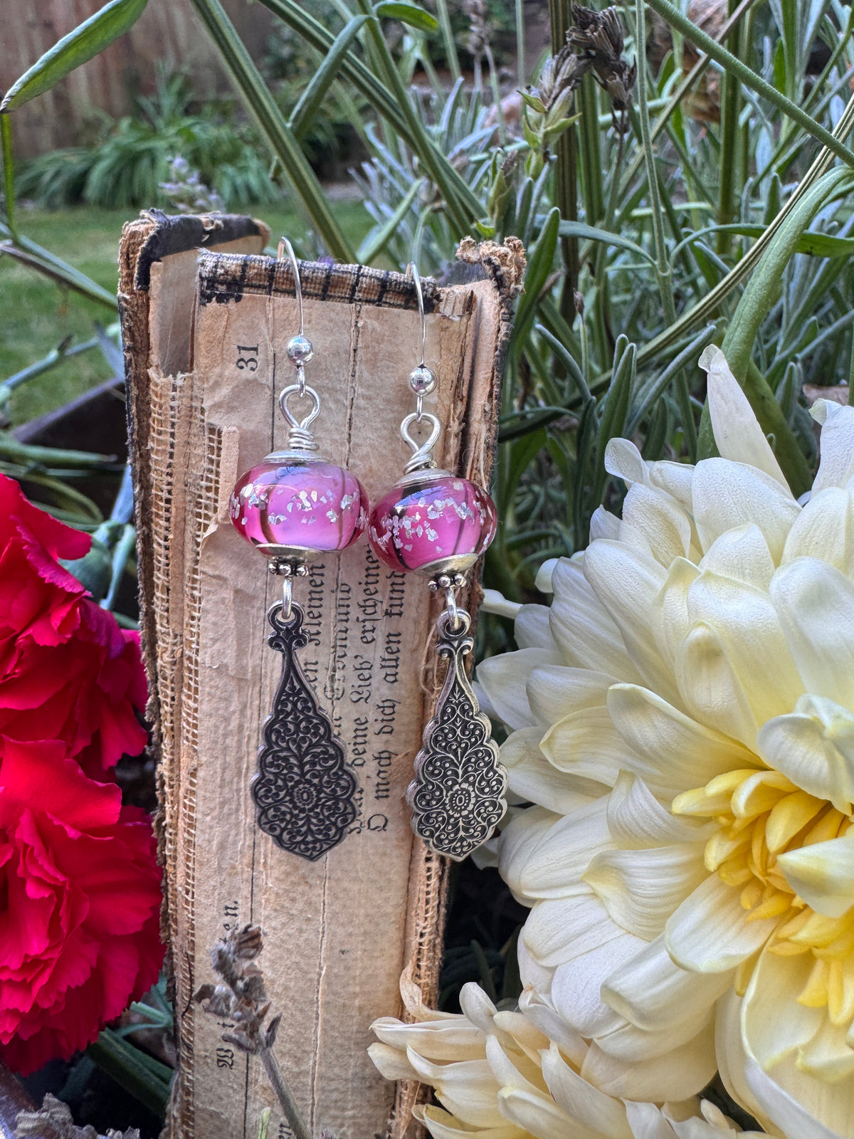 Handmade lampwork glass in pink and black, silver filigree drop, earrings.