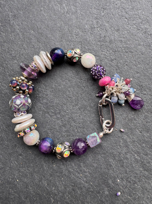 Cosmic. Handmade lampwork glass, cosmic tiger eye, pearls, rhinestones, moonstone, amethyst, silver metal, bracelet