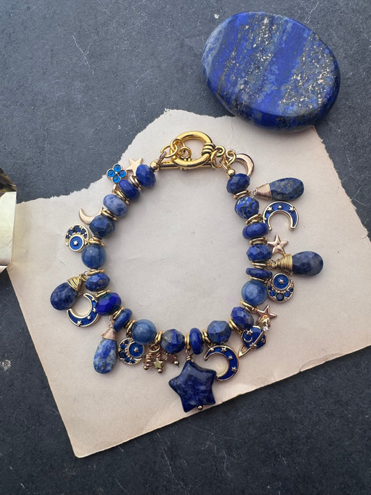 Space Charm bracelet. Mixed gemstone, charms and gold metal bracelet.