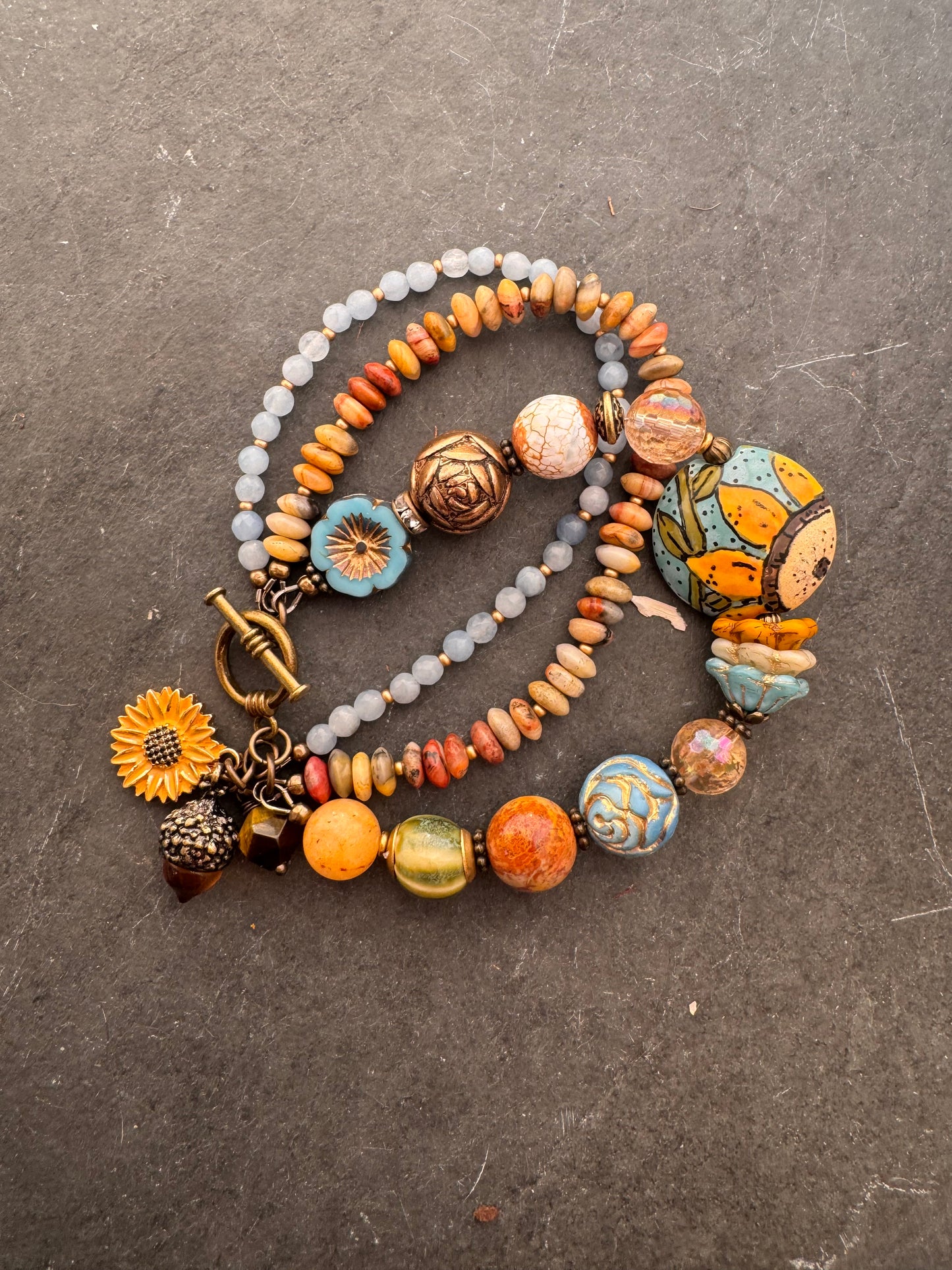 Blue sky Sunflower. 🌻ceramic beads, Handmade lampwork glass, citron, crazy lace, aquamarine, Czech glass, bronze metal, bracelet.