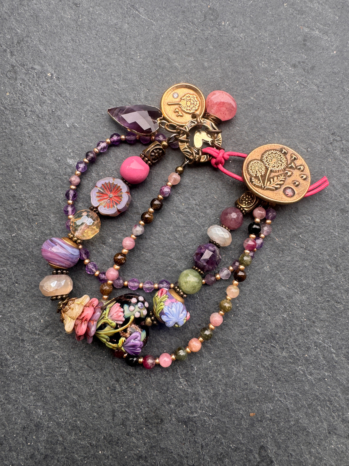 handmade lampwork glass, amethyst, tourmaline, moonstone, Madagascar rose quartz, pink tourmaline and handmade dandy lion button clasp.