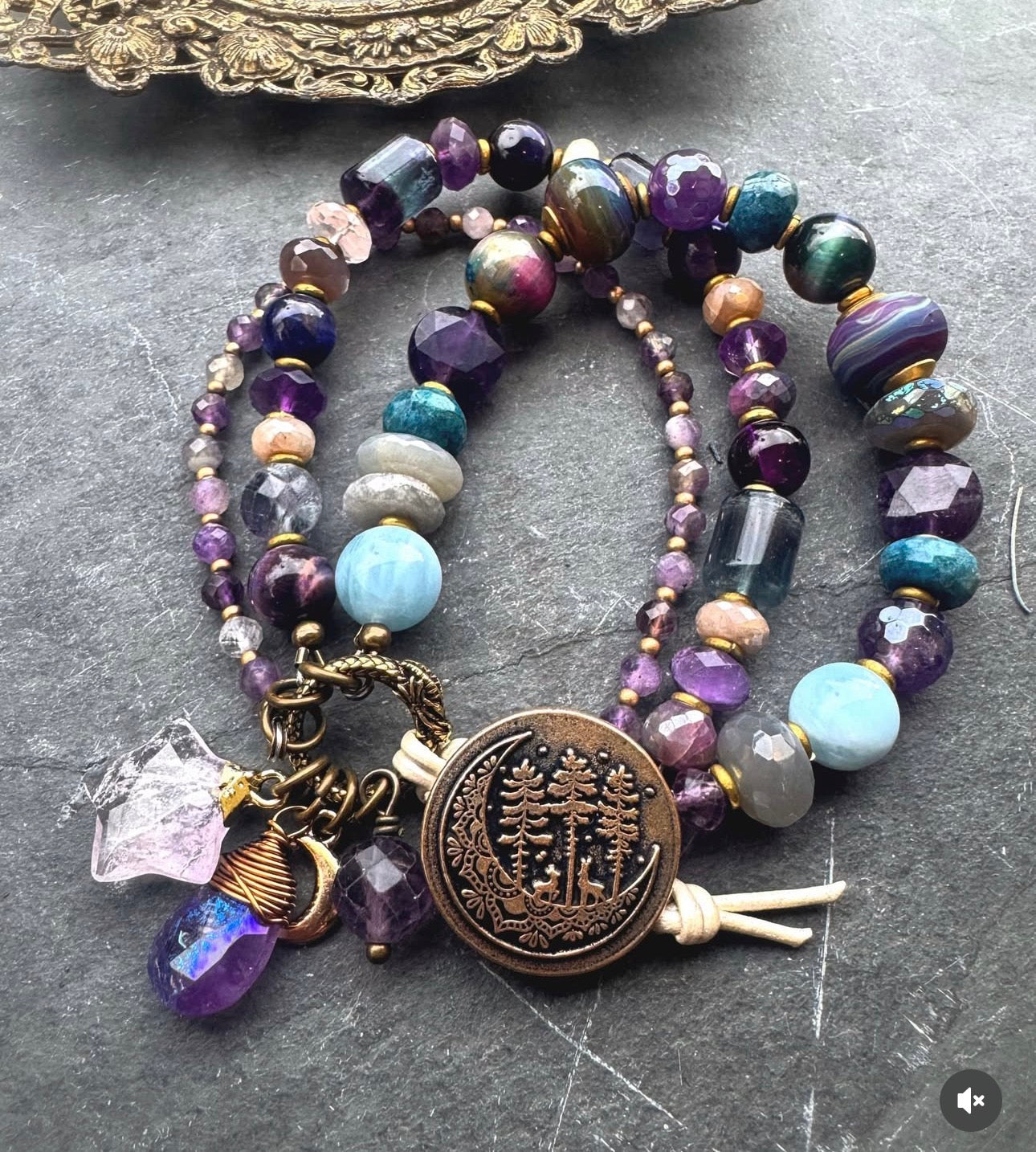handmade lampwork glass, labradorite, fluorite, tigers eye, amethyst, aquamarine, moonstone, apatite, and  handmade button clasp.
