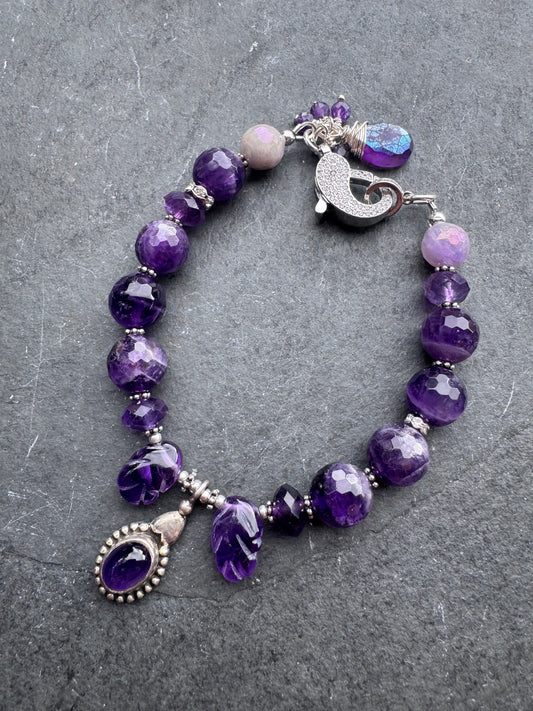 Amethyst engraved stone, faceted rounds, sterling silver drop, rhinestone clasp.925. Bracelet
