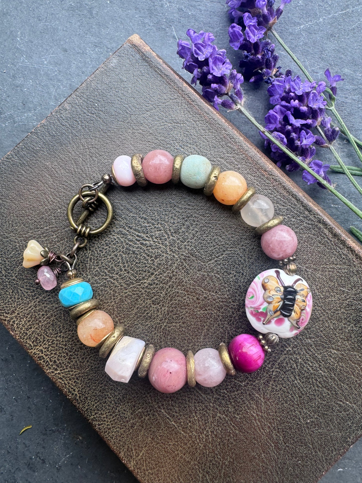 Mixed stone, glass, brass metal, bracelet.