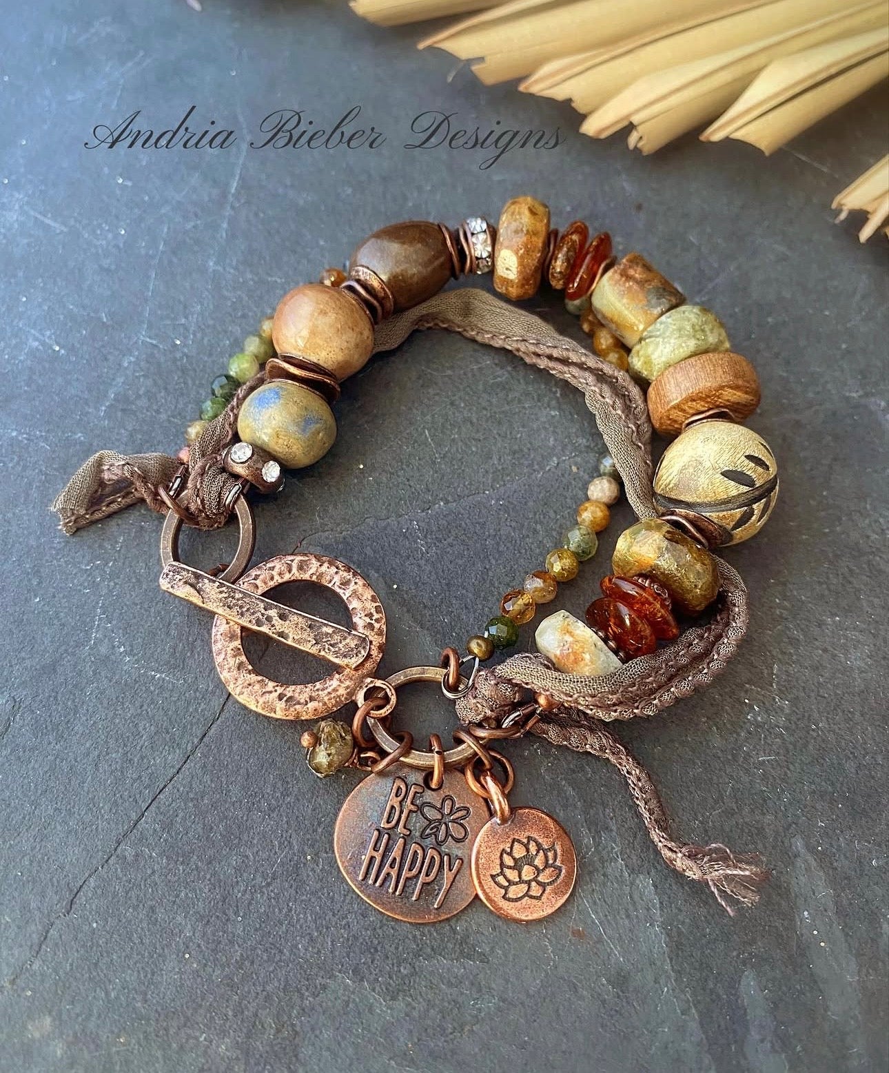 Turquoise, green garnet, amber, wood,ceramic, bronze metal, silk ribbon, bracelet
