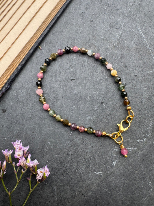 Watermelon tourmaline faceted round stone, gold metal, bracelet