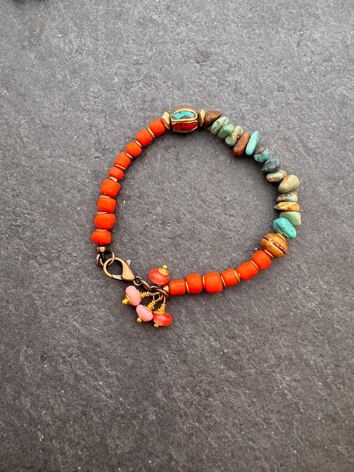 Turquoise, African glass, brass metal bracelet.