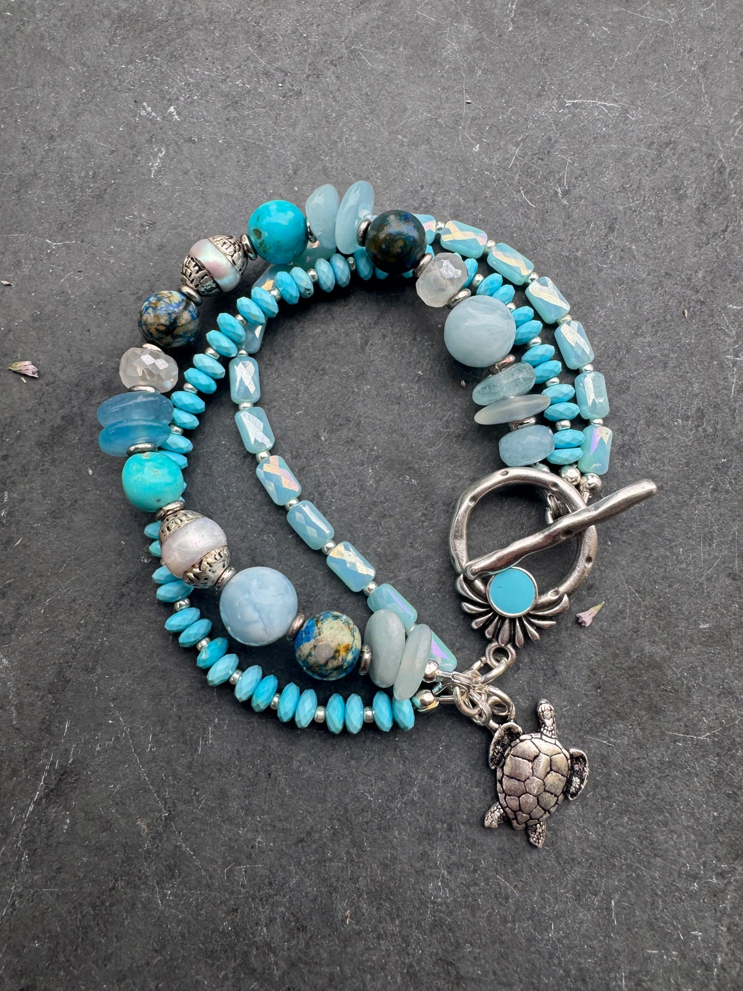Turquoise, aquamarine, moonstone, pearl, glass, silver metal, bracelet.