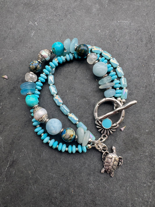 Turquoise, aquamarine, moonstone, pearl, glass, silver metal, bracelet.