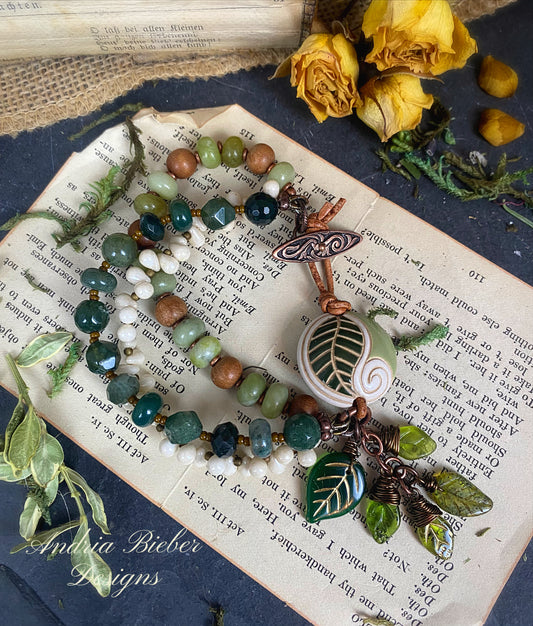 Ceramic leaf bead, mixed green stones, sandalwood, cream Czech glass drops, copper metal, multi strand, bracelet