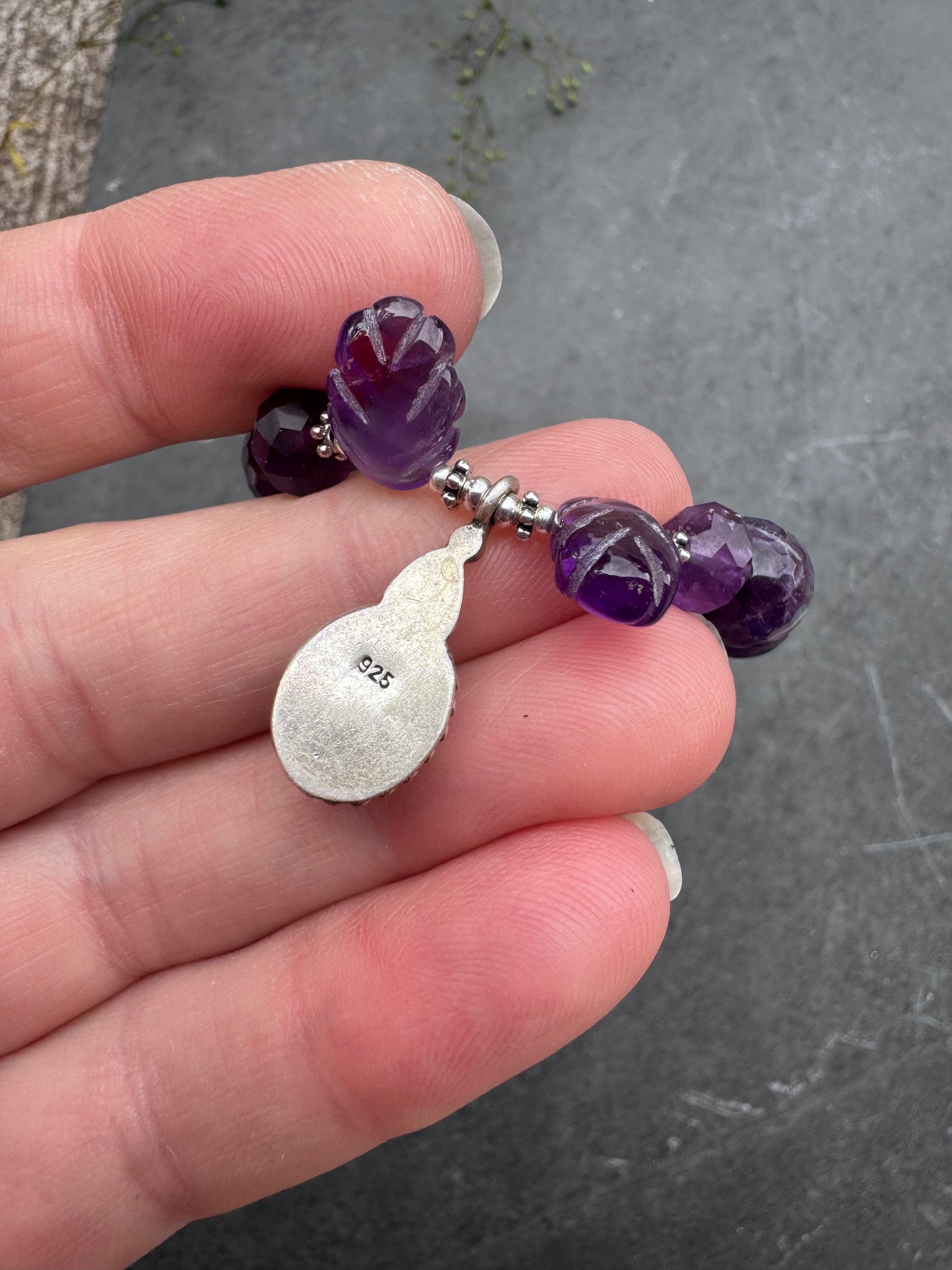 Amethyst engraved stone, faceted rounds, sterling silver drop, rhinestone clasp.925. Bracelet