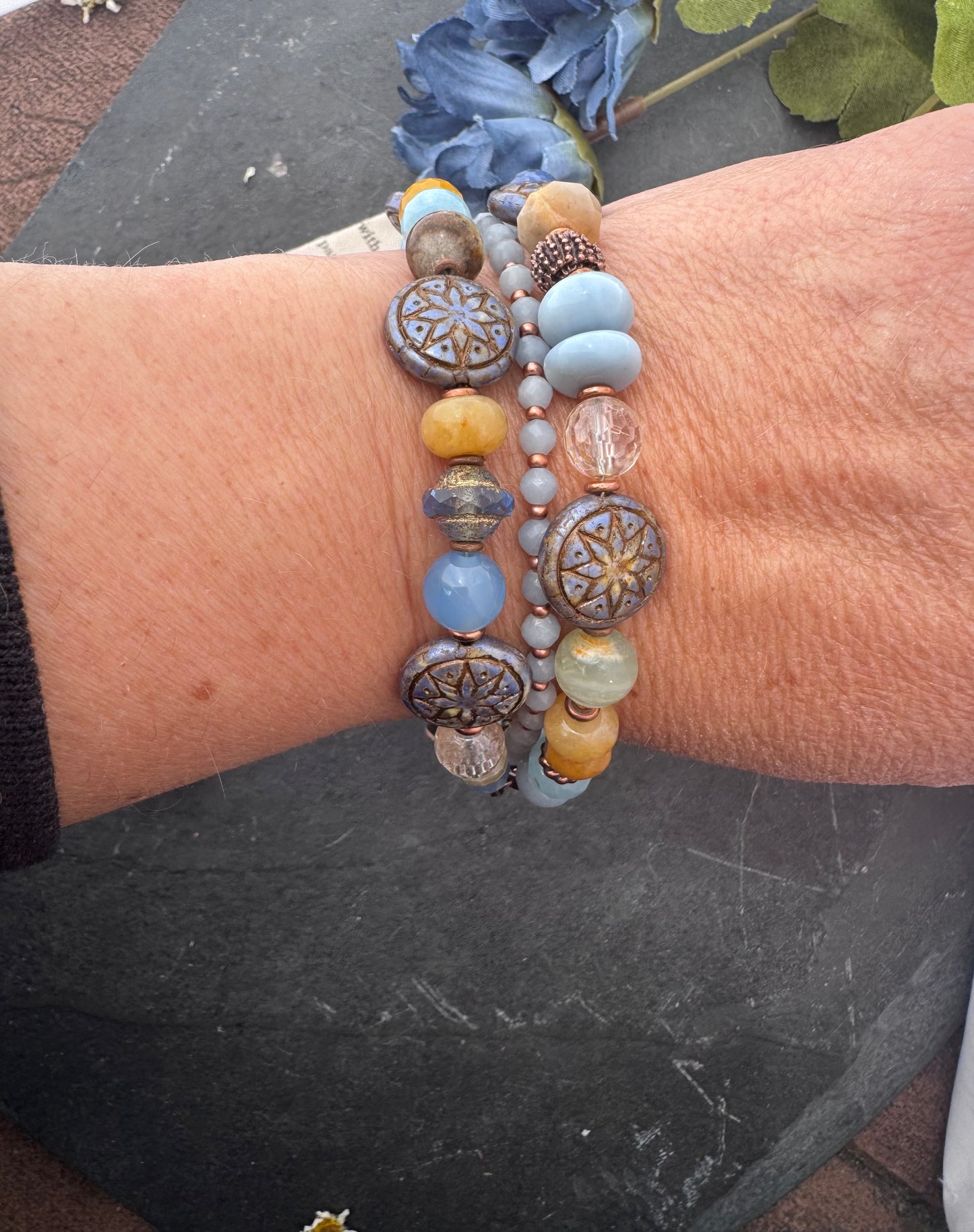 Blue opal, yellow jasper, Czech glass, citrine, agate, blue aventurine, Aquatine Lemurian Blue Calcite and copper metal.