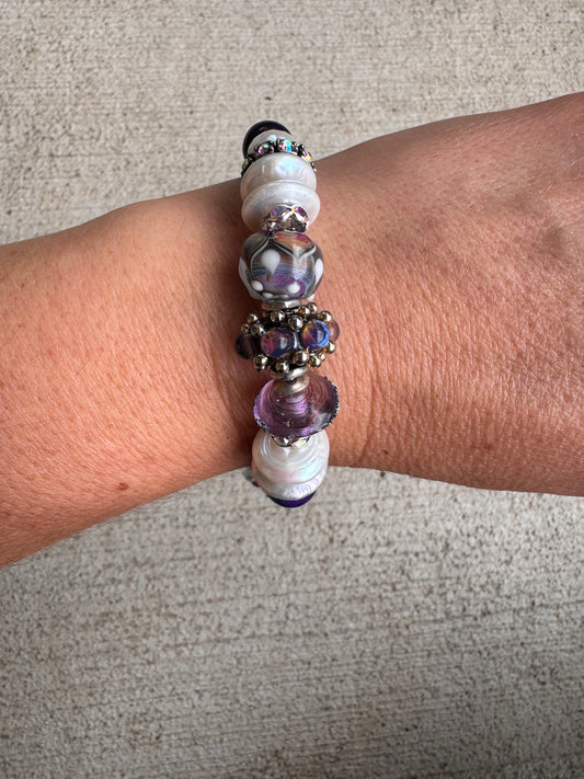 Cosmic. Handmade lampwork glass, cosmic tiger eye, pearls, rhinestones, moonstone, amethyst, silver metal, bracelet