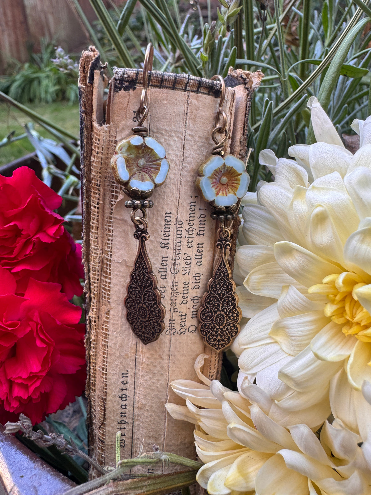 Czech glass blue flowers, brass filigree metal, earrings