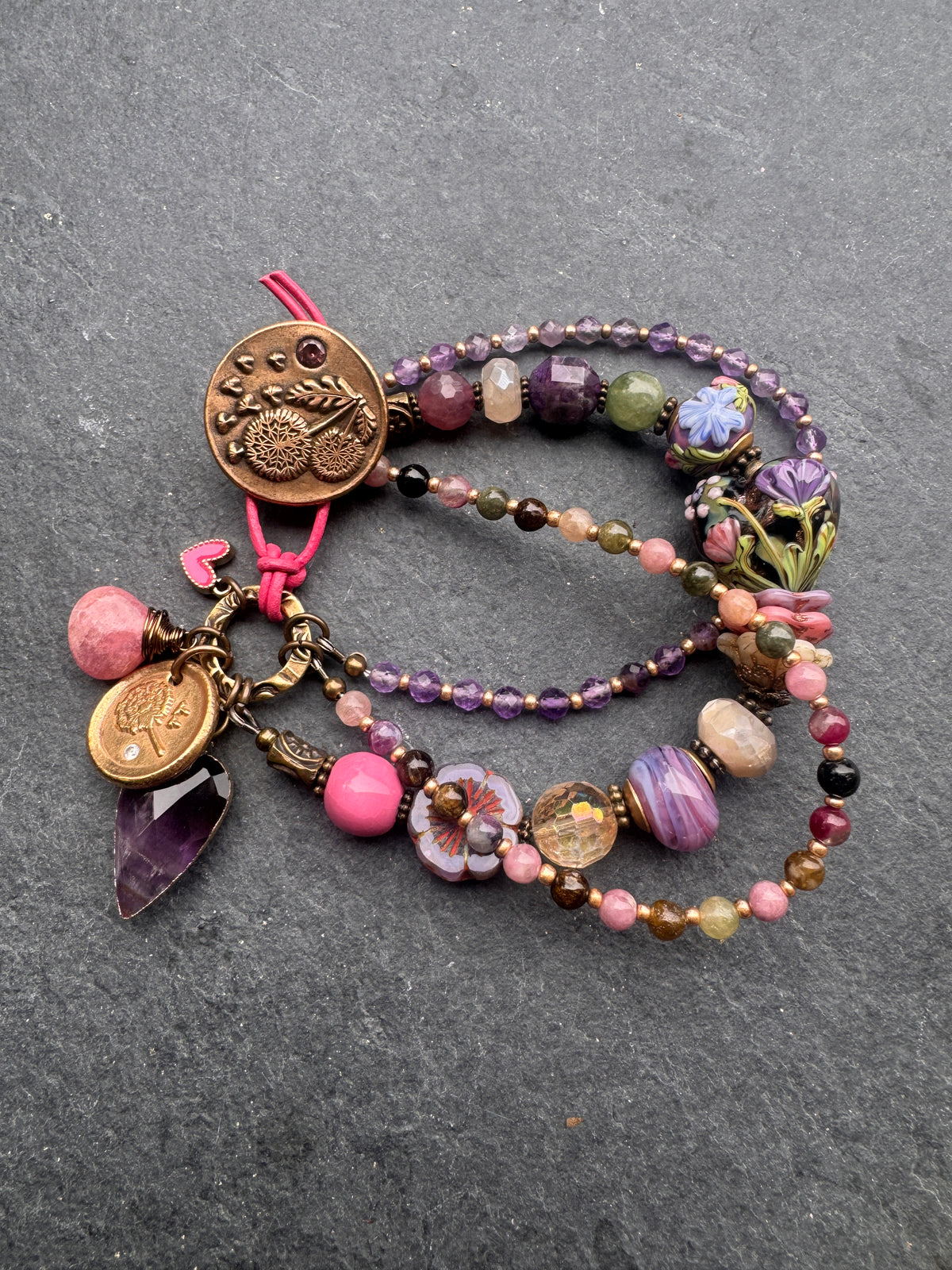 handmade lampwork glass, amethyst, tourmaline, moonstone, Madagascar rose quartz, pink tourmaline and handmade dandy lion button clasp.