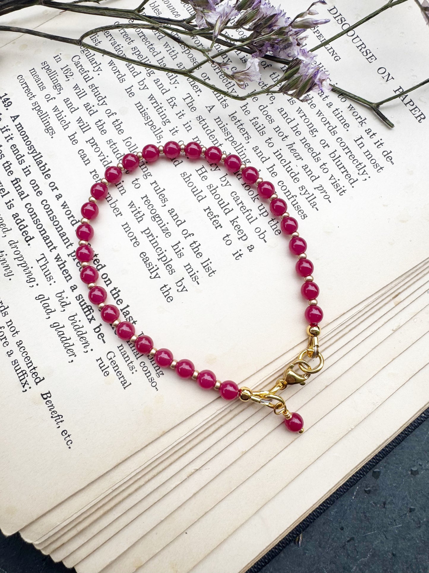Ruby round stone, gold metal, bracelet
