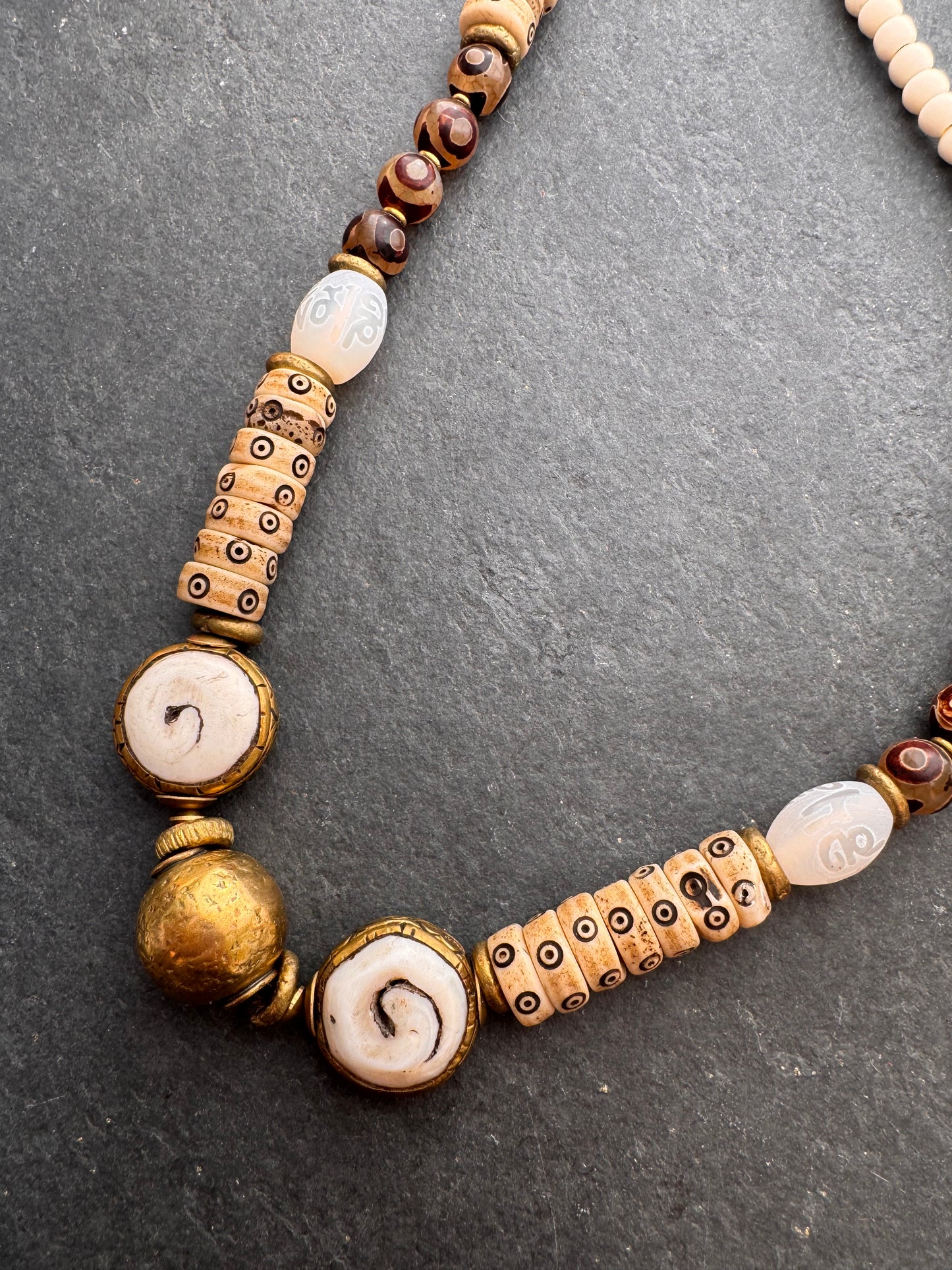 Java glass, African brass, dzi agate, bone, necklace