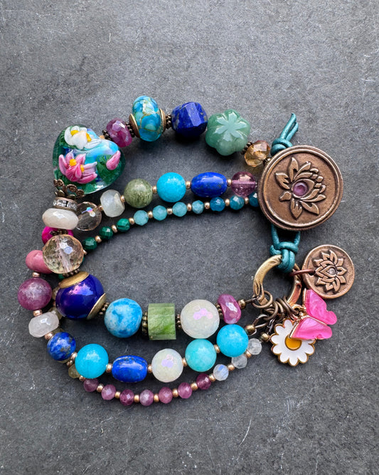 Lotus flower. Lampwork glass, mixed stone, ceramic,lotus flower bronze button.