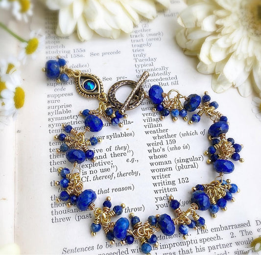 Lapis lazuli stone, gold metal, evil eye, bracelet. KIT
