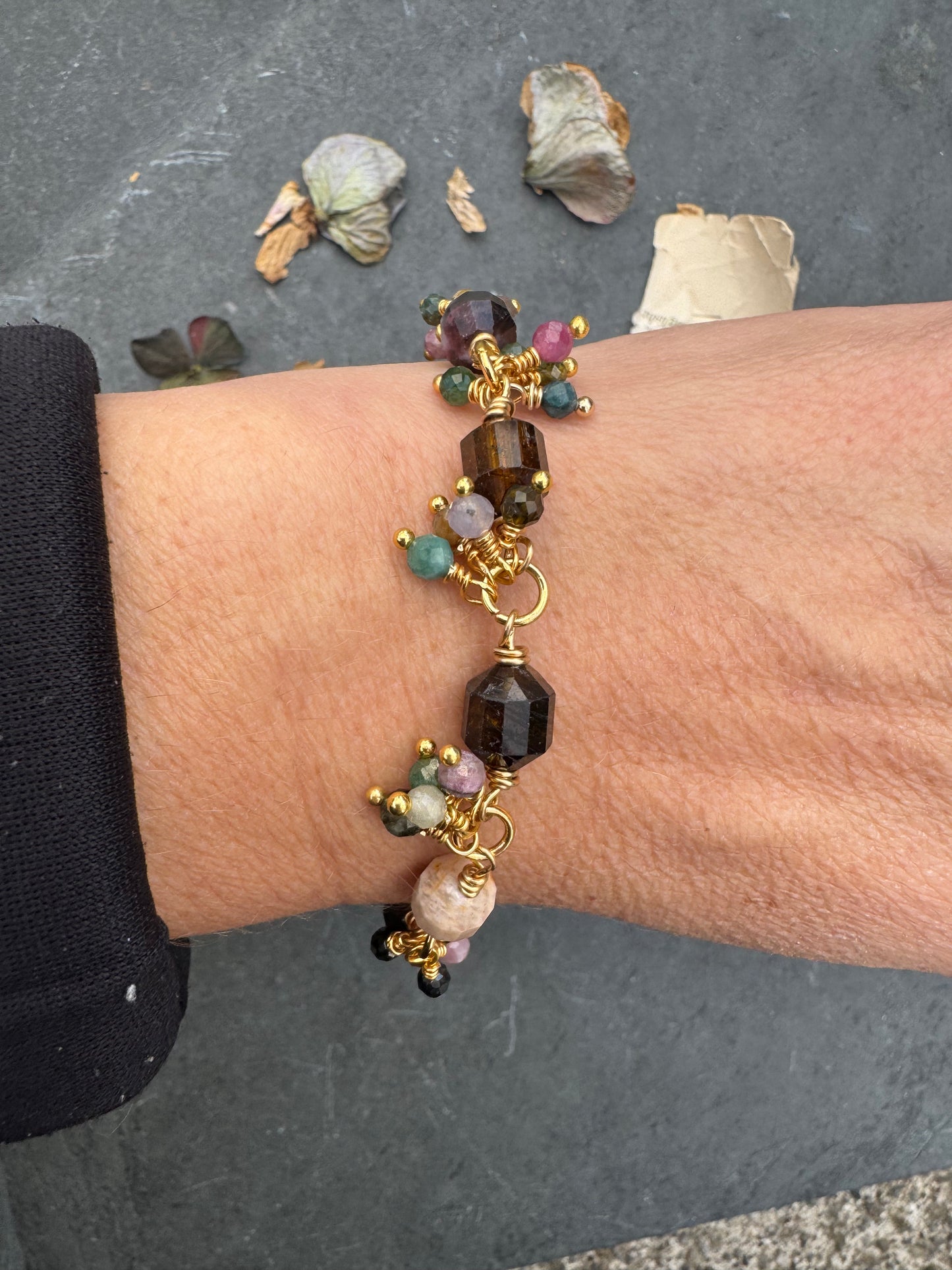 Watermelon tourmaline stone, wire wrapped, gold metal bracelet.
