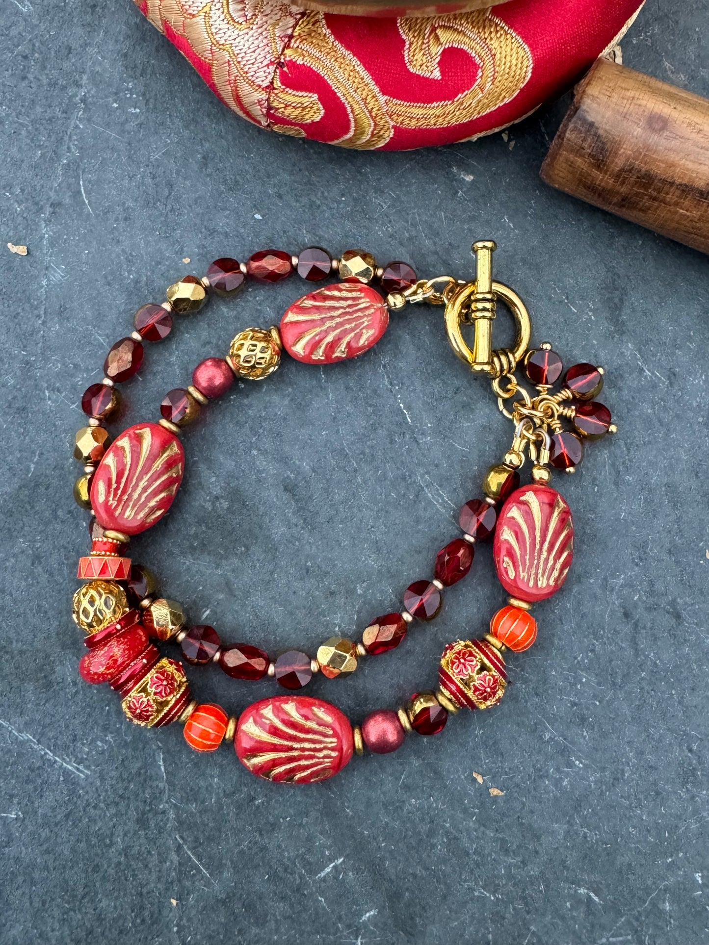 Red Czech glass, red coral, cloisonne, gold metal, bracelet
