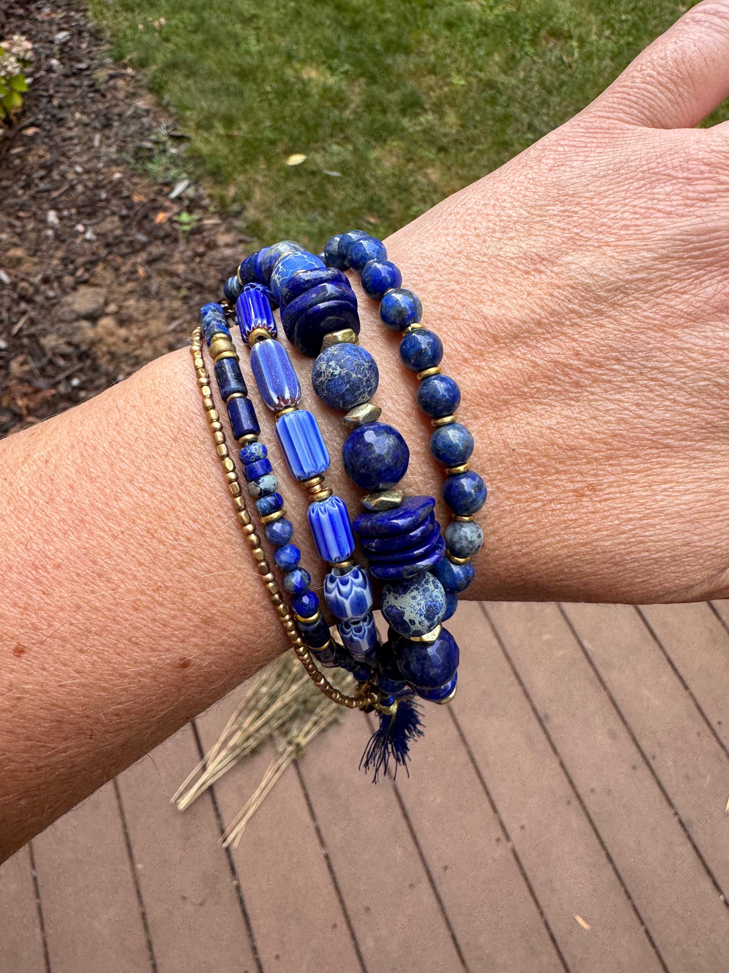Lapis lazuli, African glass, agate, brass metal bracelet.