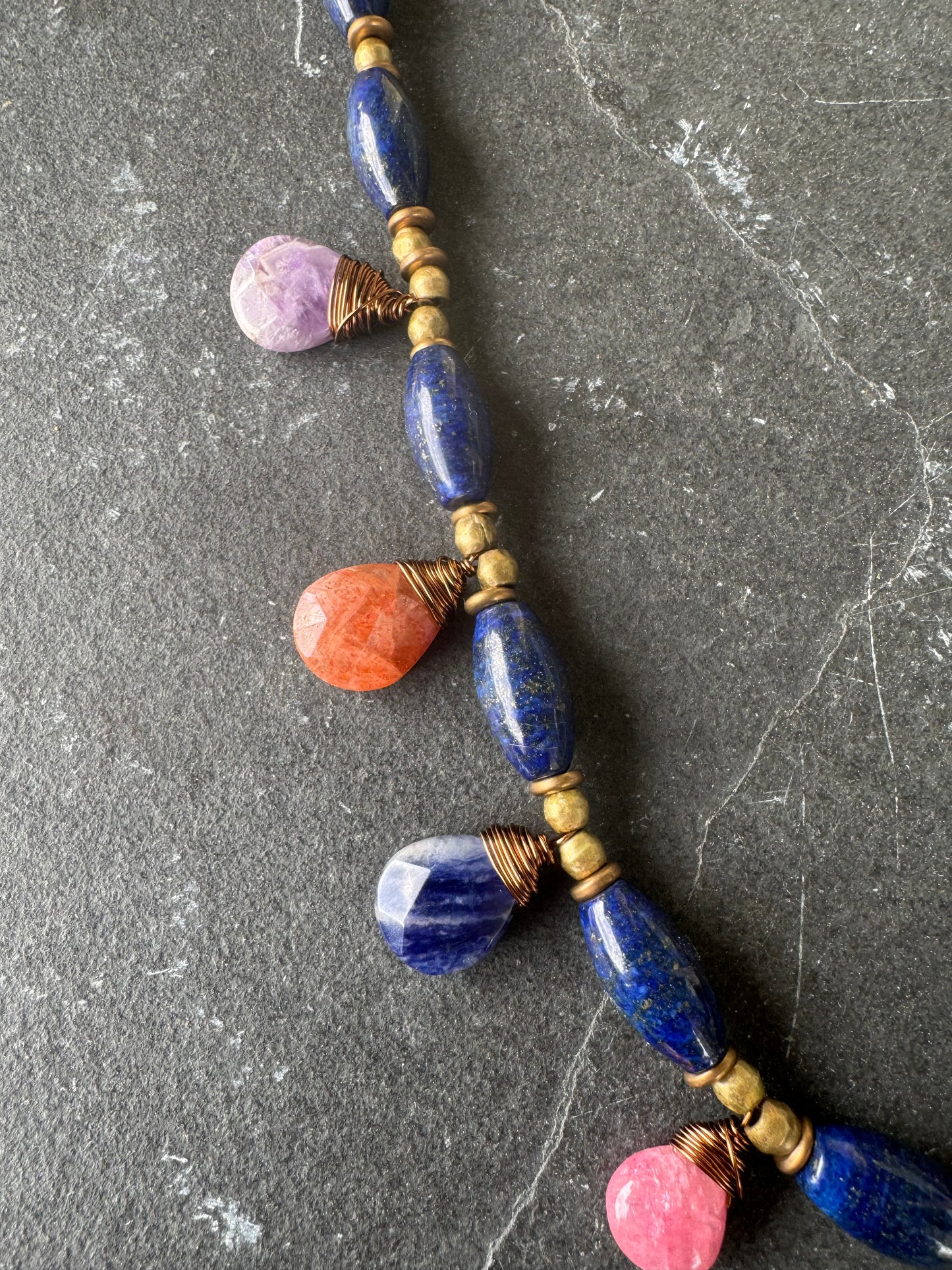 Lapis stone and mixed gemstone necklace. African brass.
