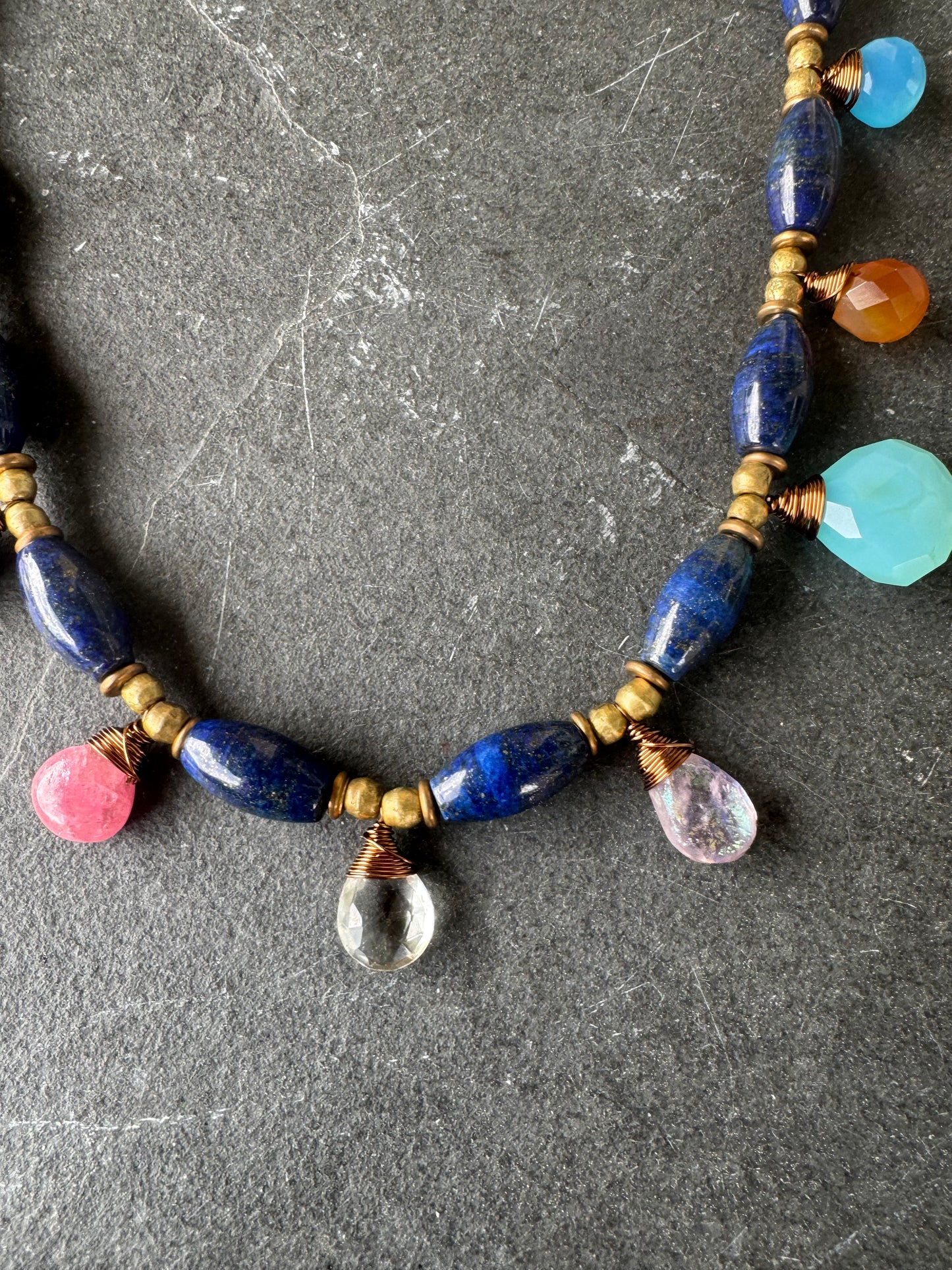 Lapis stone and mixed gemstone necklace. African brass.