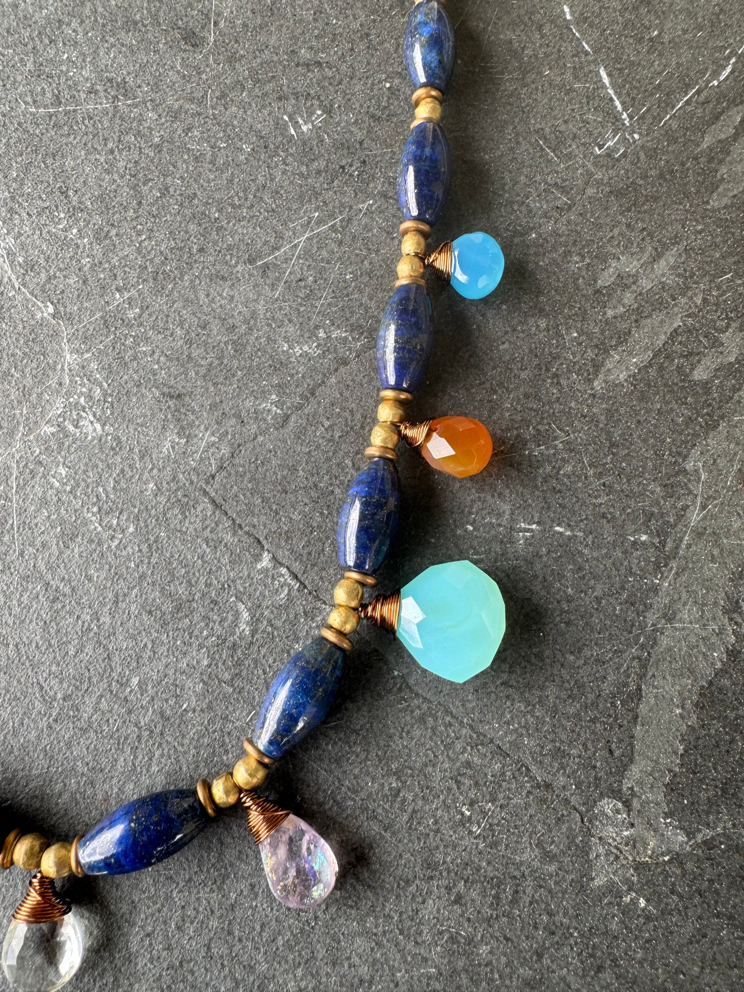 Lapis stone and mixed gemstone necklace. African brass.