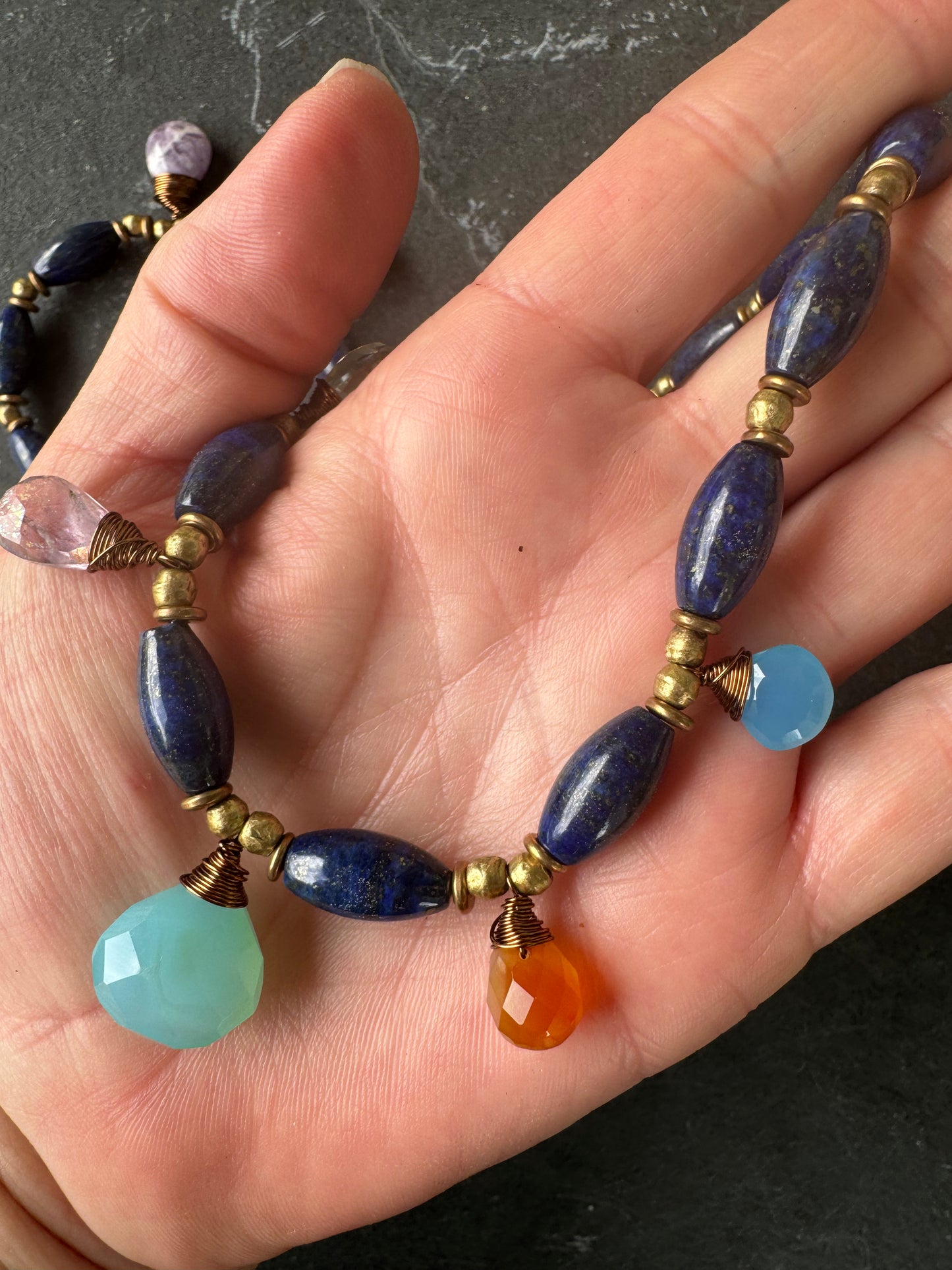 Lapis stone and mixed gemstone necklace. African brass.