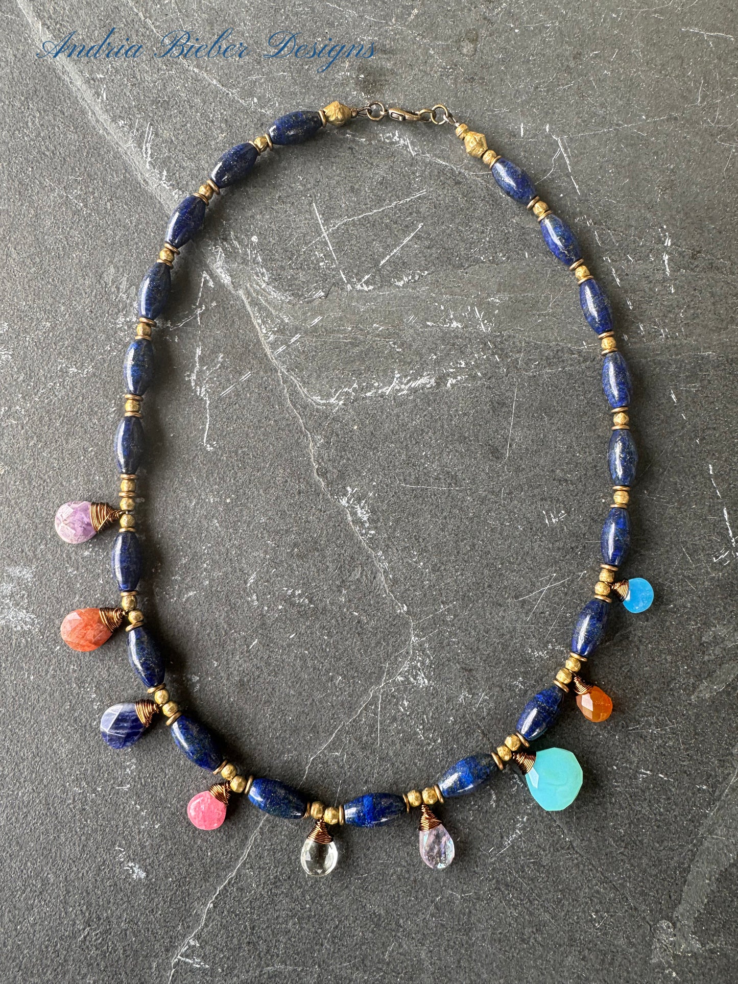 Lapis stone and mixed gemstone necklace. African brass.