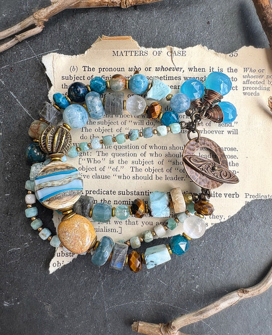 Larimar gemstone, aquamarine, moonstone, blue chalcedony, labradorite, apatite, tiger eye, lampwork , ceramic, Amazonite stone, brass metal.