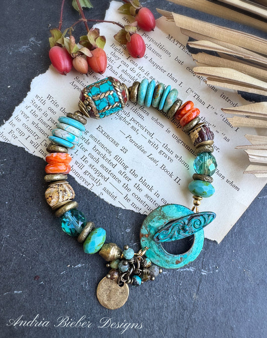 African brass, turquoise stone, Nepal center bead with coral and turquoise stone inlay, spiny oyster, African ceramic beads, Czech glass and custom made patina clasp. bracelet, jewelry