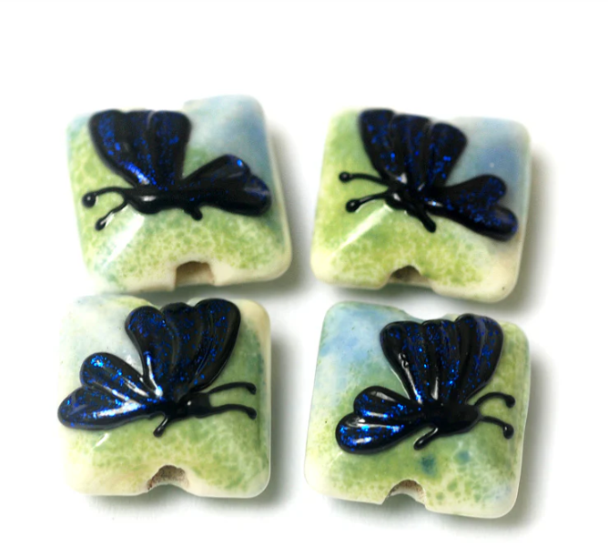 Four Blue Sparkle Garden Butterfly Pillow Beads