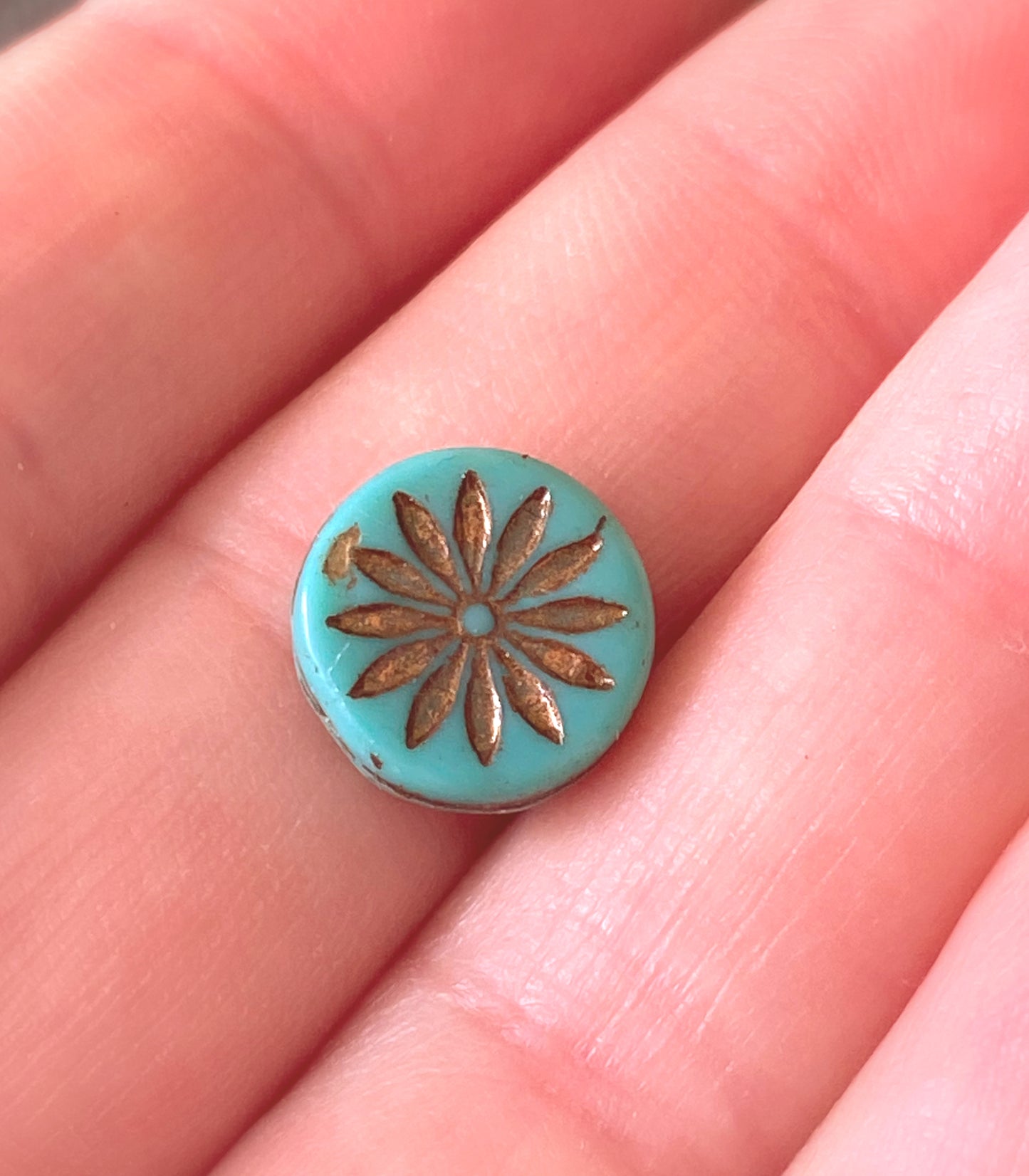 Czech glass, Coin with Aster (12mm) Turquoise Opaque with Dark Bronze Wash