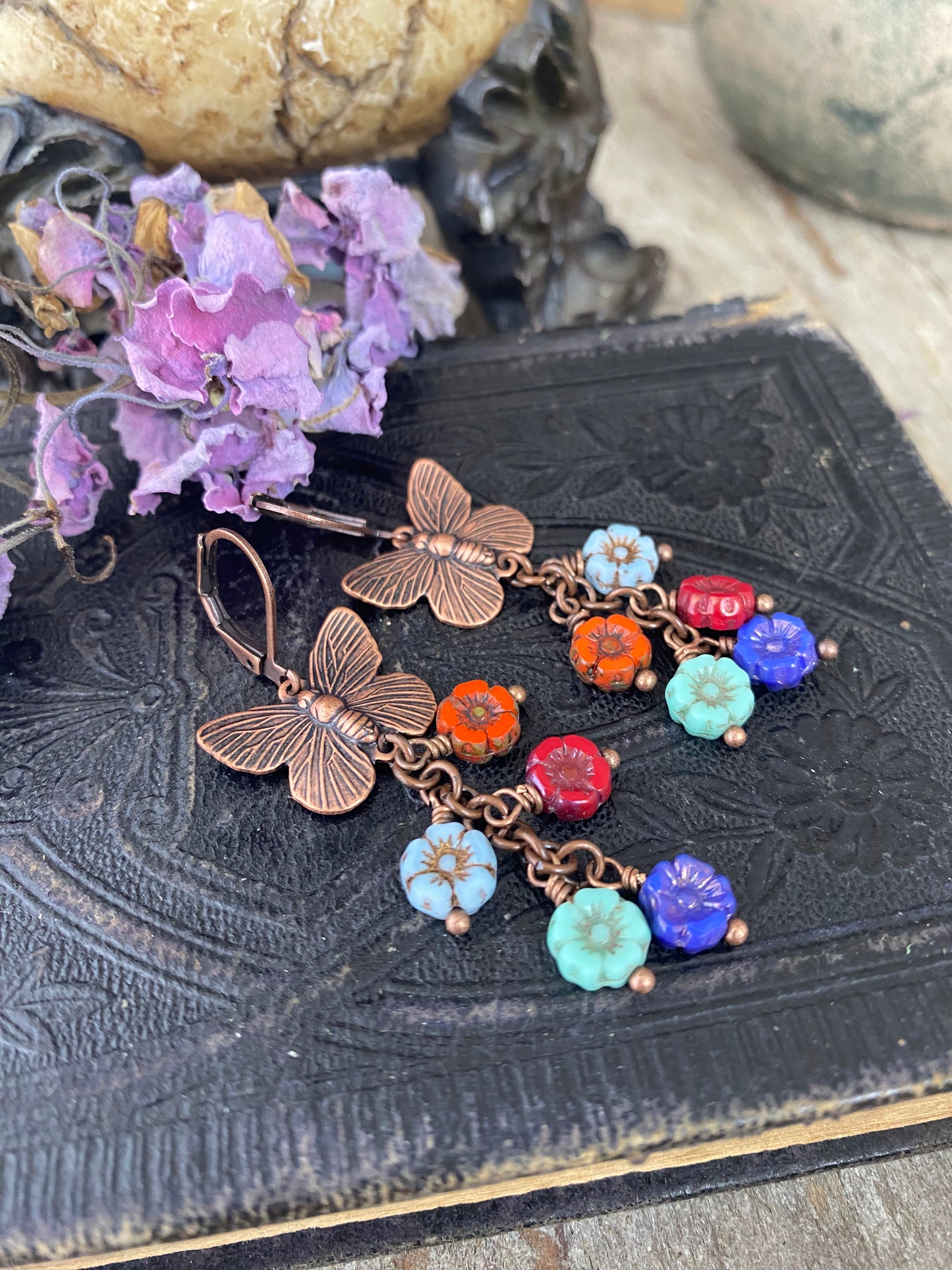 Copper butterfly charms, mixed colors Czech glass flower bead caps, bronze metal, earrings