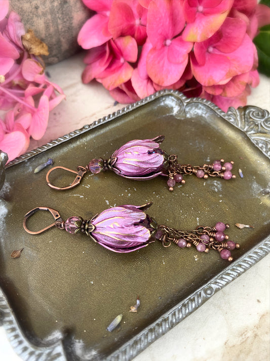 Pink crystal glass, pink tourmaline stone, flower bead caps, and copper metal earrings.