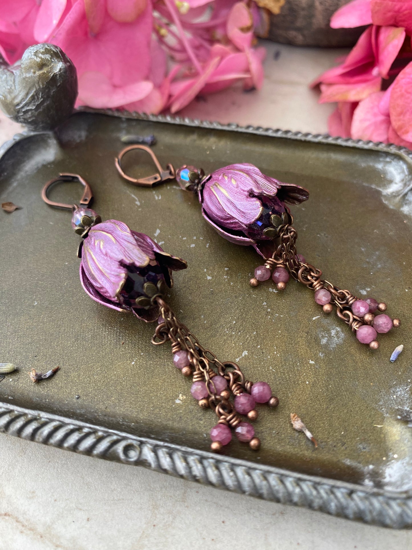 Pink crystal glass, pink tourmaline stone, flower bead caps, and copper metal earrings.