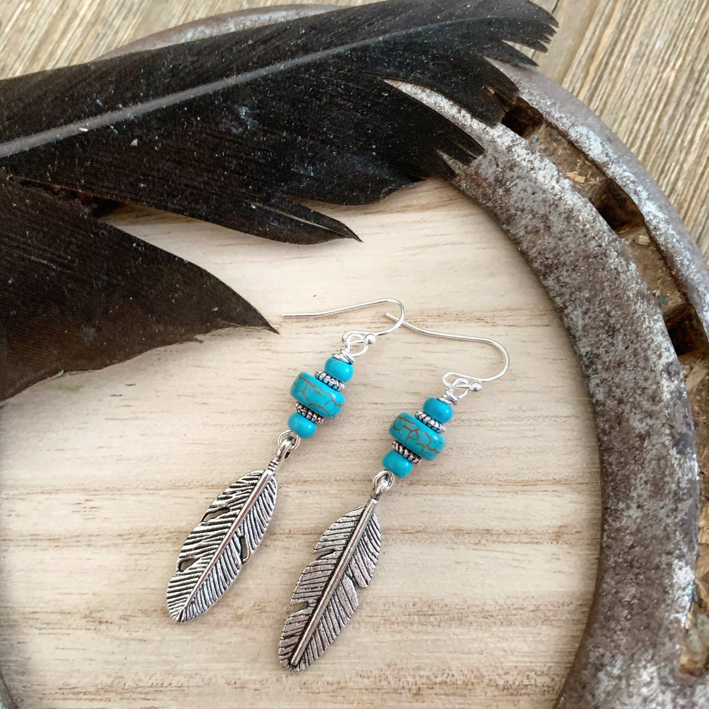 Feather charms in silver, blue turquoise stone and sterling silver earrings. - Andria Bieber Designs 