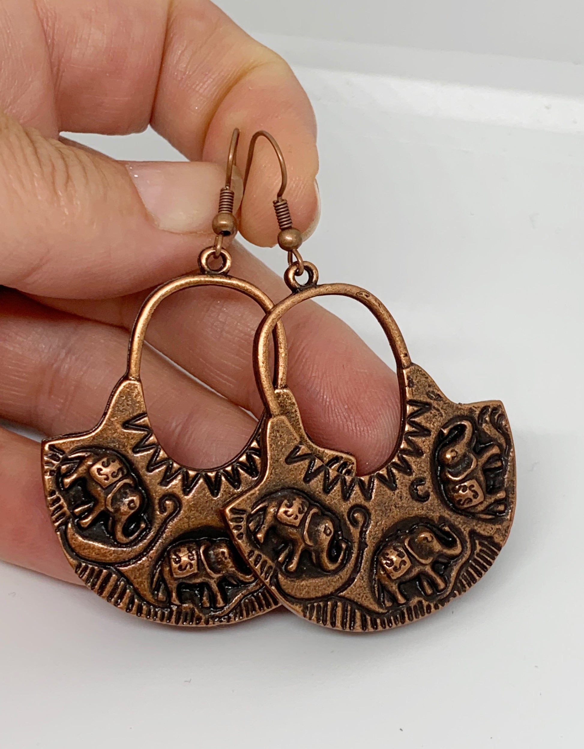 Elephant hoops, copper metal earrings - Andria Bieber Designs 
