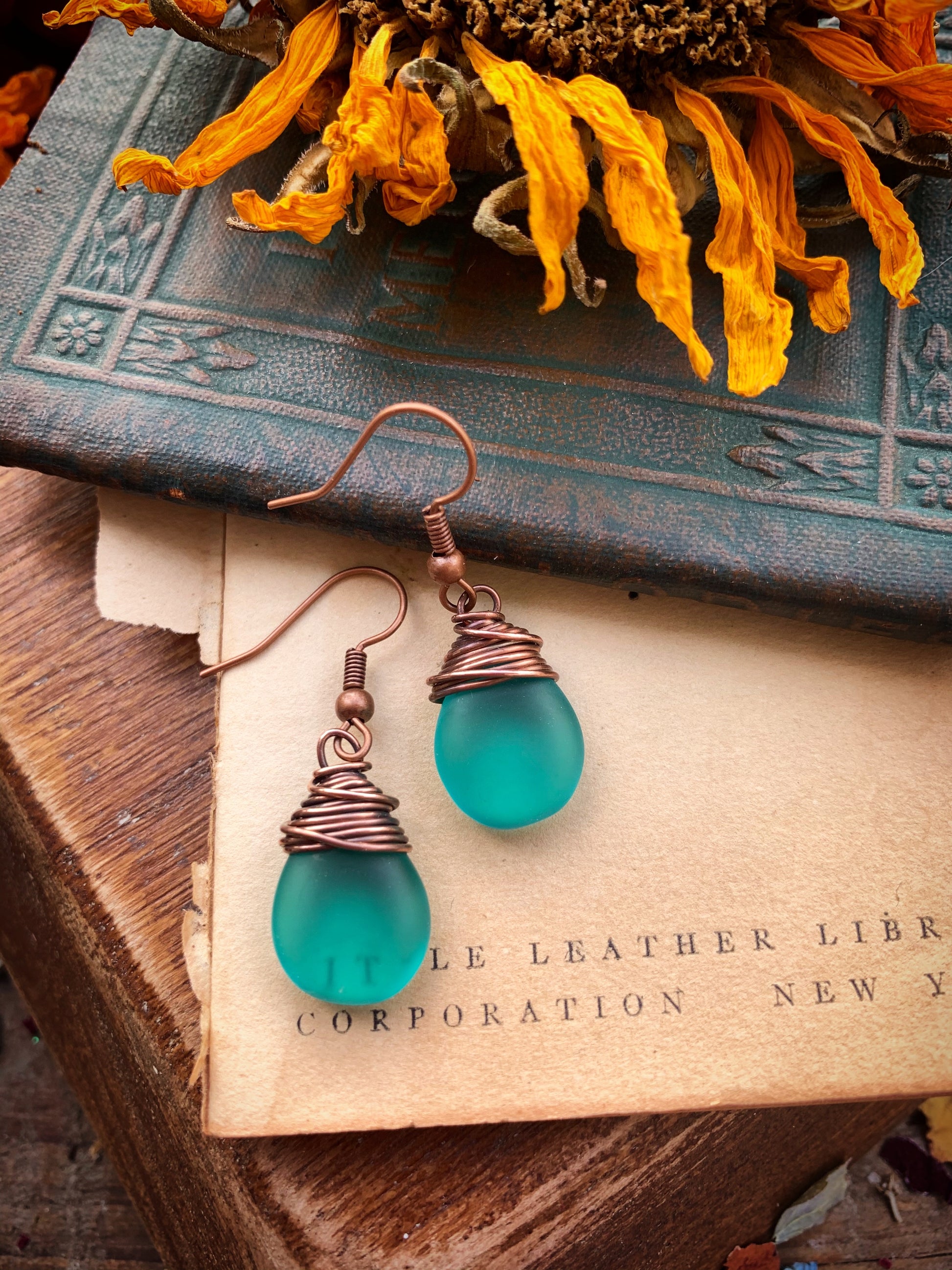 Frosted teal teardrop Czech glass and copper wire wrapped earrings. - Andria Bieber Designs 