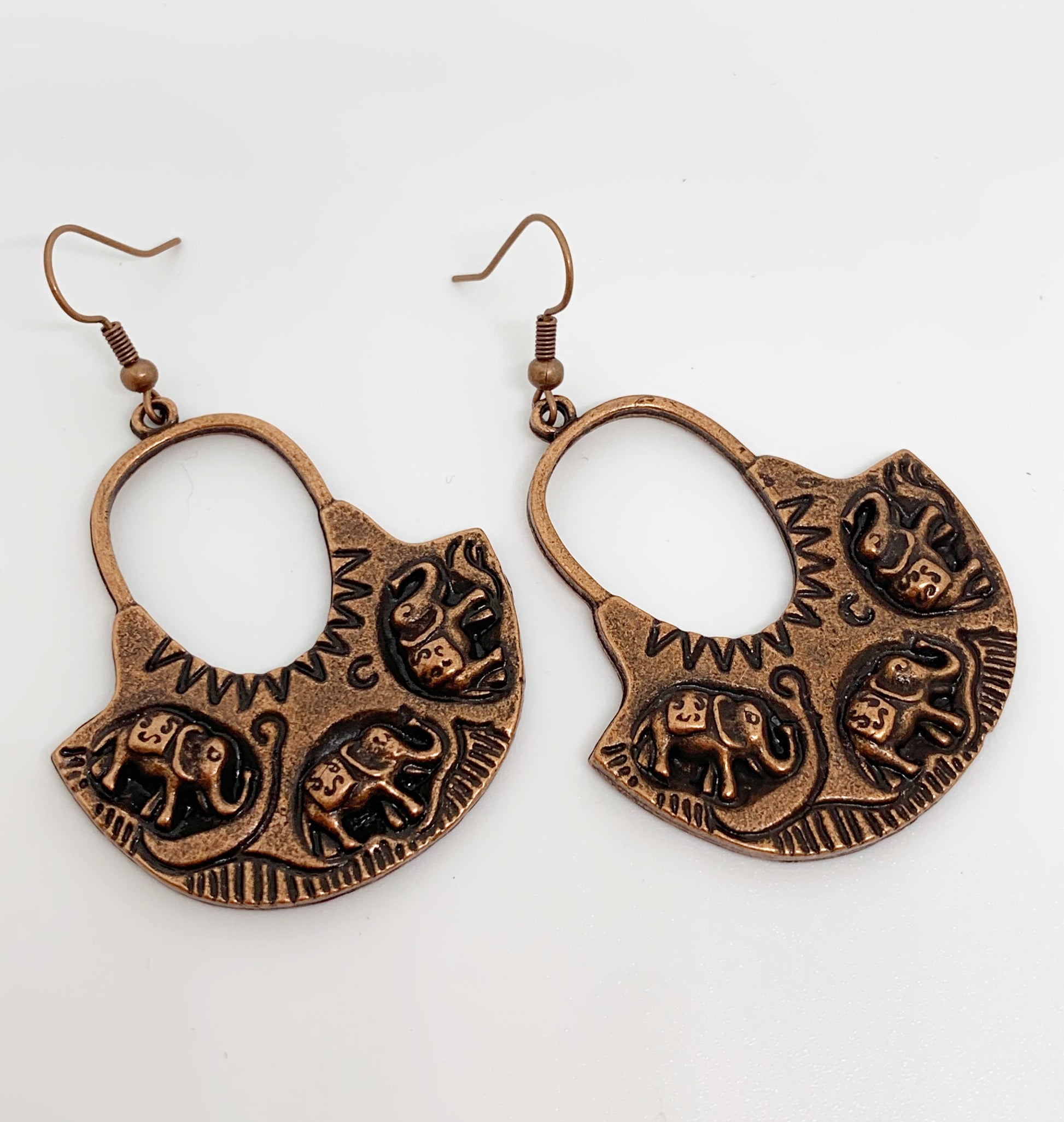 Elephant hoops, copper metal earrings - Andria Bieber Designs 