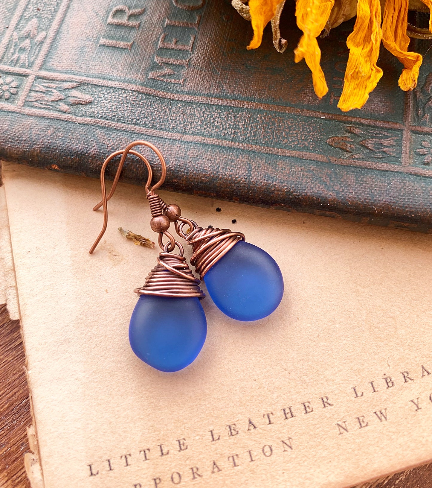 Blue frosted teardrop Czech glass and copper wire wrapped earrings. - Andria Bieber Designs 