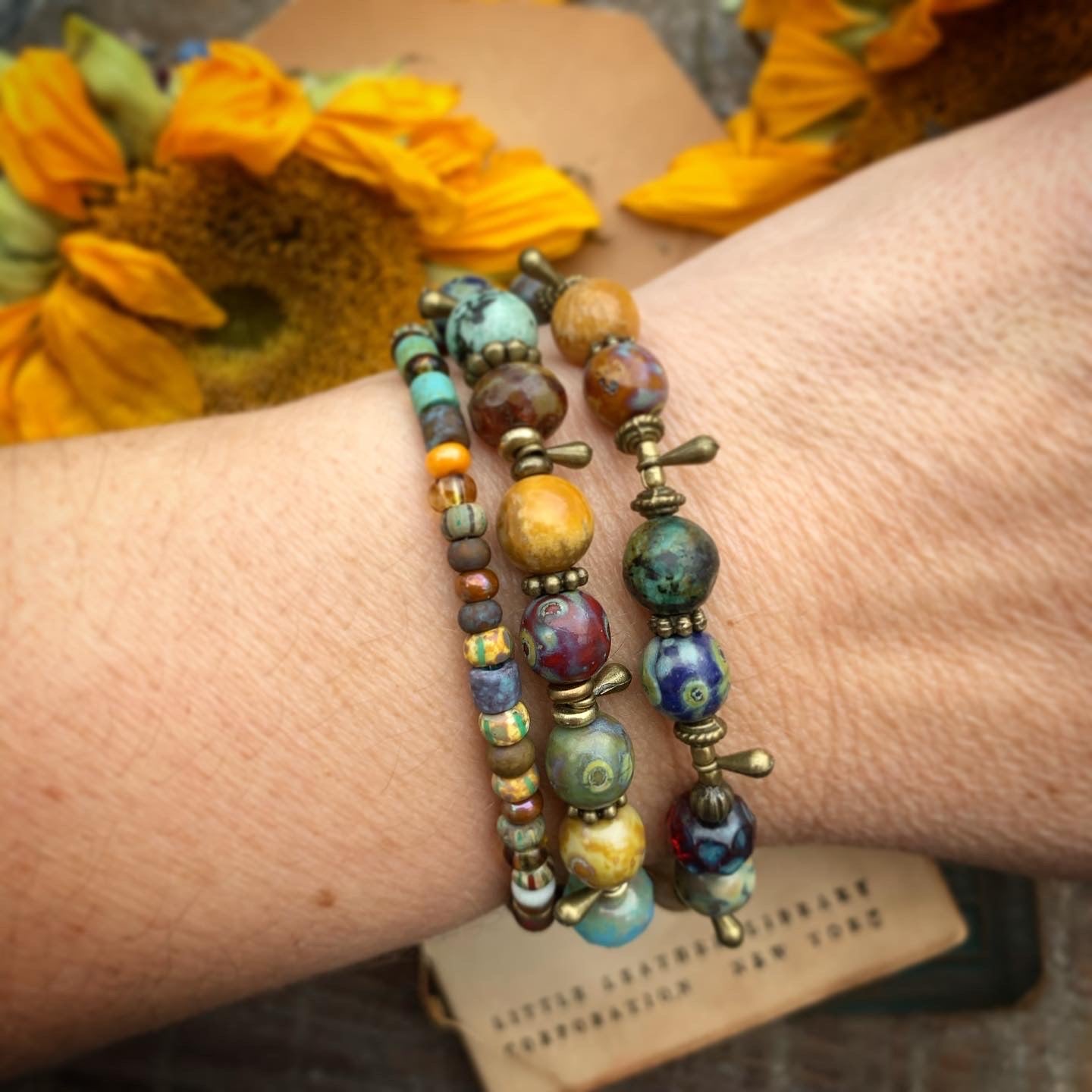 Namaste. Czech glass, multi strand, bronze metal bracelet. - Andria Bieber Designs 