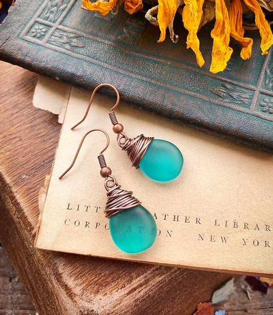 Frosted teal teardrop Czech glass and copper wire wrapped earrings. - Andria Bieber Designs 