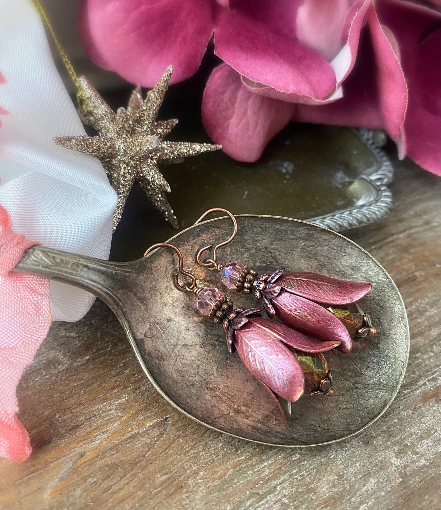 Rose pink polish glass, Vintaj flower bead caps, pink crystal, and copper metal earrings.