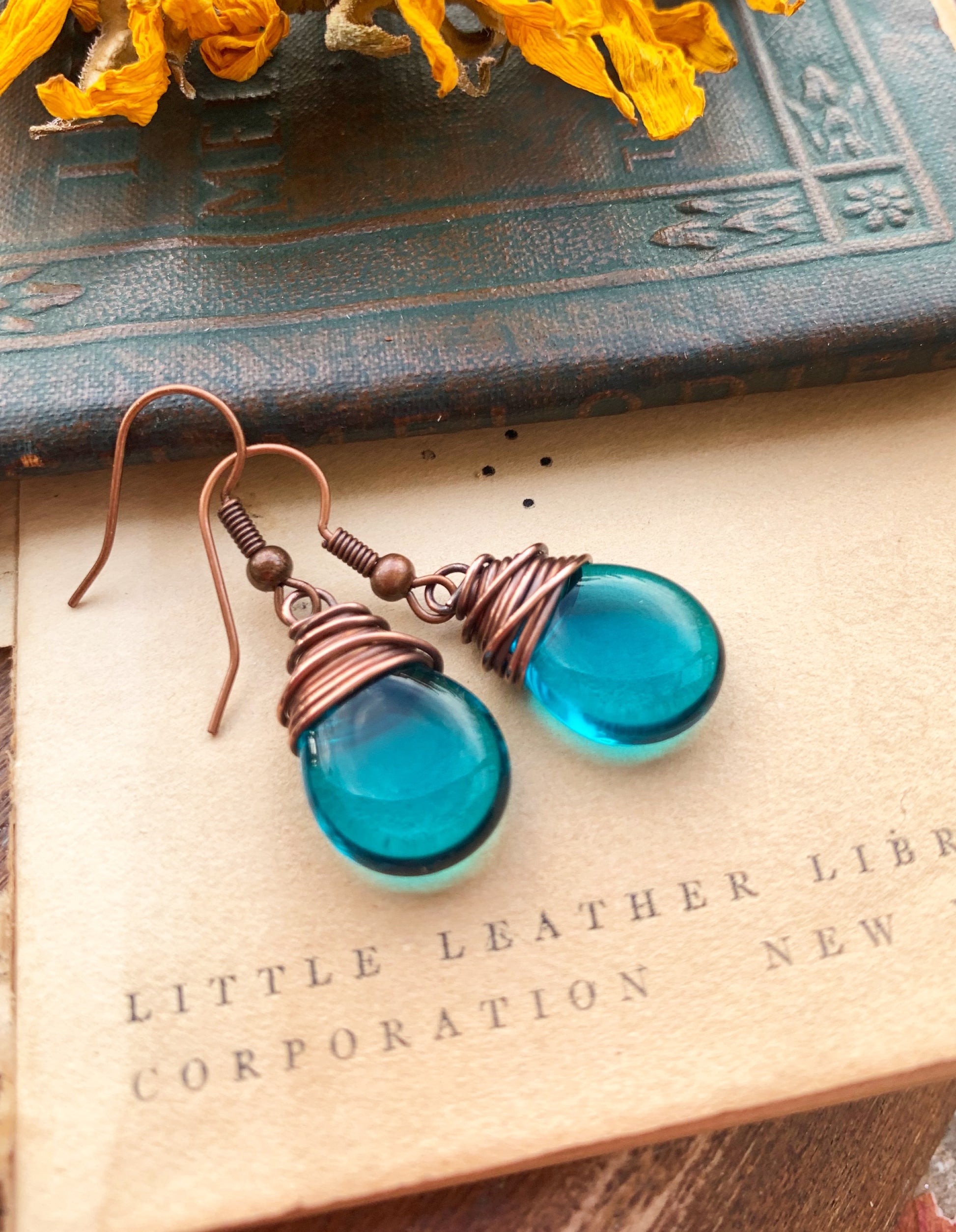 Teal dark transparent teardrop Czech glass and copper wire wrapped earrings. - Andria Bieber Designs 