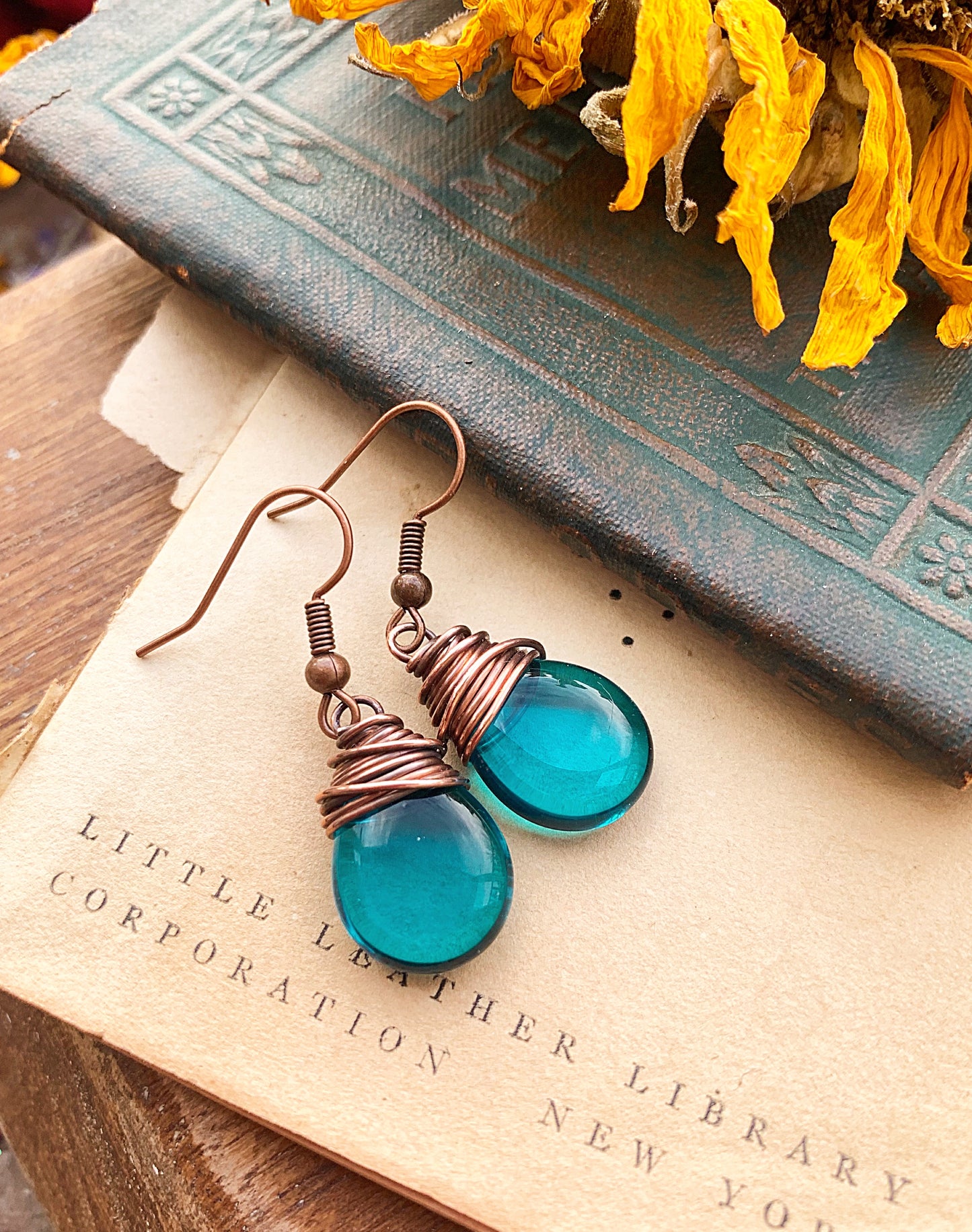 Teal dark transparent teardrop Czech glass and copper wire wrapped earrings. - Andria Bieber Designs 