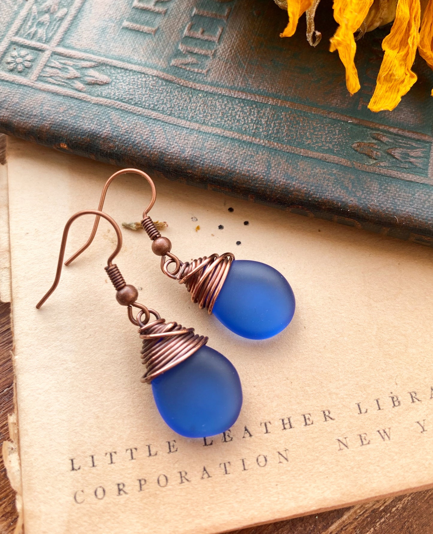 Blue frosted teardrop Czech glass and copper wire wrapped earrings. - Andria Bieber Designs 