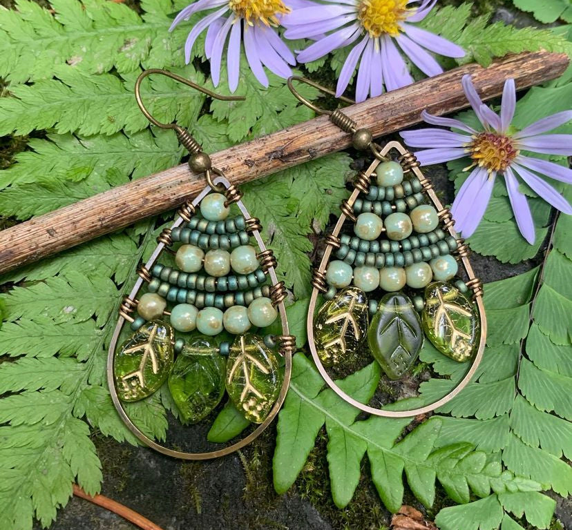 Green Czech glass leaves. Bronze metal hoops, wire wrapped, earrings